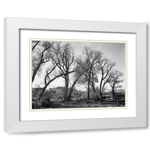 At Taos Pueblo National Historic Landmark, New Mexico, ca. 1941-1942 White Modern Wood Framed Art Print with Double Matting by Adams, Ansel