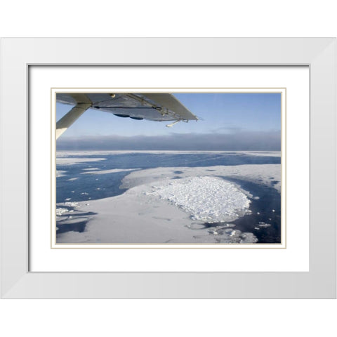 Canada, Manitoba, Aerial view of ice on the bay White Modern Wood Framed Art Print with Double Matting by Kaveney, Wendy