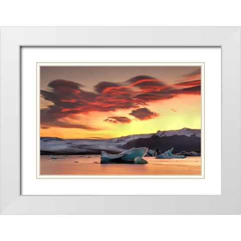 Icebergs from the Jokulsarlon glacier adrift in sunset in Jokulsarlon lagoon in Iceland White Modern Wood Framed Art Print with Double Matting by Steve Mohlenkamp