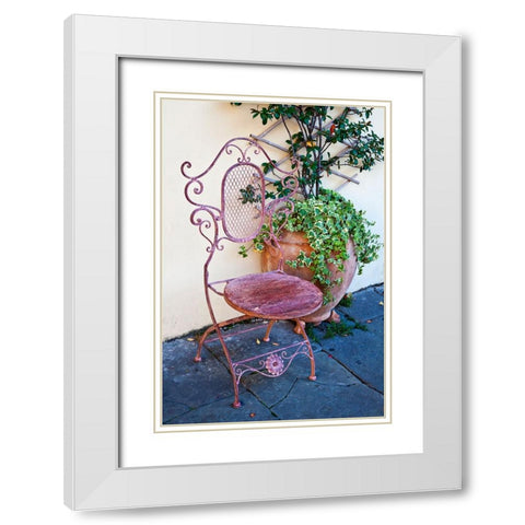 Italy-Tuscany-Lucca Decorative chair and potted plant outside a shop Piazza dellAnfiteatro Romano White Modern Wood Framed Art Print with Double Matting by Eggers, Julie