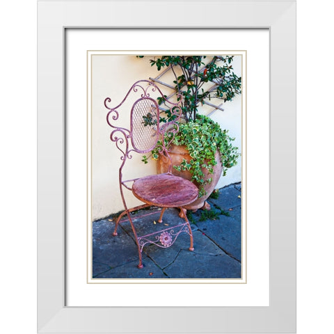 Italy-Tuscany-Lucca Decorative chair and potted plant outside a shop Piazza dellAnfiteatro Romano White Modern Wood Framed Art Print with Double Matting by Eggers, Julie