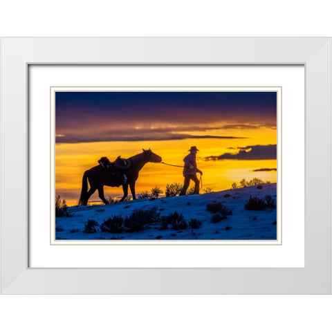 USA- Wyoming. Hideout Horse Ranch- wrangler and horse at sunset. White Modern Wood Framed Art Print with Double Matting by Looney, Hollice
