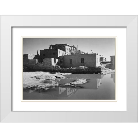 Adobe House with Water in Foreground - Acoma Pueblo, New Mexico - National Parks and Monuments, ca. White Modern Wood Framed Art Print with Double Matting by Adams, Ansel