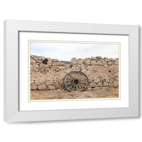 Wagon wheel against a stone fence at Hueco Tanks State Park, northwest of El Paso, TX White Modern Wood Framed Art Print with Double Matting by Highmith, Carol