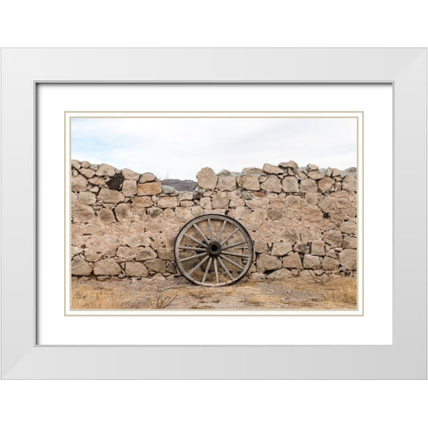 Wagon wheel against a stone fence at Hueco Tanks State Park, northwest of El Paso, TX White Modern Wood Framed Art Print with Double Matting by Highmith, Carol