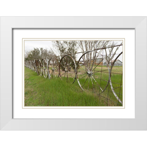 A fence made of wagon wheels near Schulenburg in Fayette County, TX White Modern Wood Framed Art Print with Double Matting by Highmith, Carol