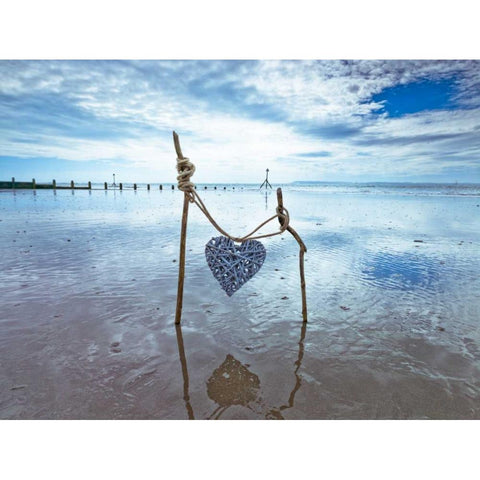 Heart tied up on wooden sticks at the beach Black Modern Wood Framed Art Print by Frank, Assaf