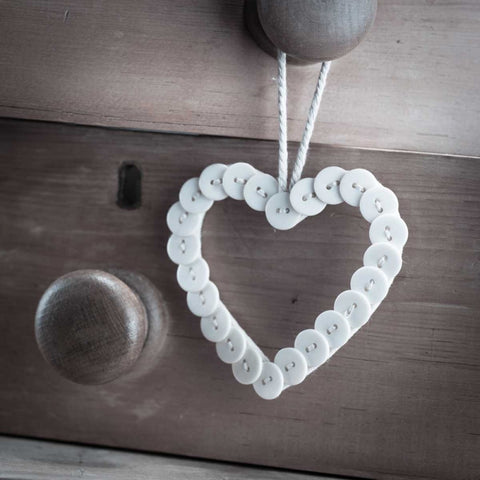 heart made of buttons hunging on a handle Black Ornate Wood Framed Art Print with Double Matting by Frank, Assaf