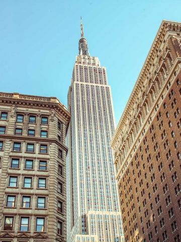 Low angle shot of a Empire State building - New York White Modern Wood Framed Art Print with Double Matting by Frank, Assaf