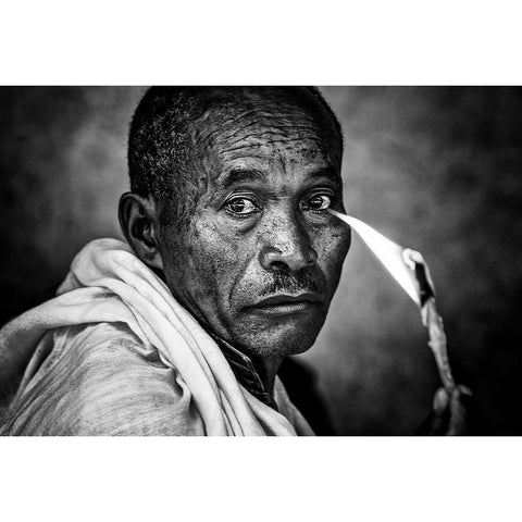 Ethiopian Man Holding A Lit Candle In A Religious Ceremony. White Modern Wood Framed Art Print by Inazio Kuesta, Joxe