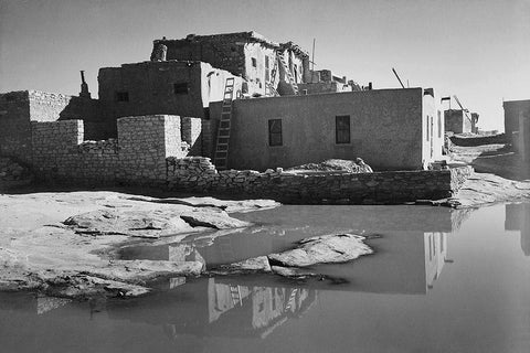 Adobe House with Water in Foreground - Acoma Pueblo, New Mexico - National Parks and Monuments, ca. White Modern Wood Framed Art Print with Double Matting by Adams, Ansel