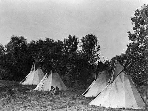 An Assiniboin camp containing four tepees with Indians seated on ground White Modern Wood Framed Art Print with Double Matting by Curtis, Edward