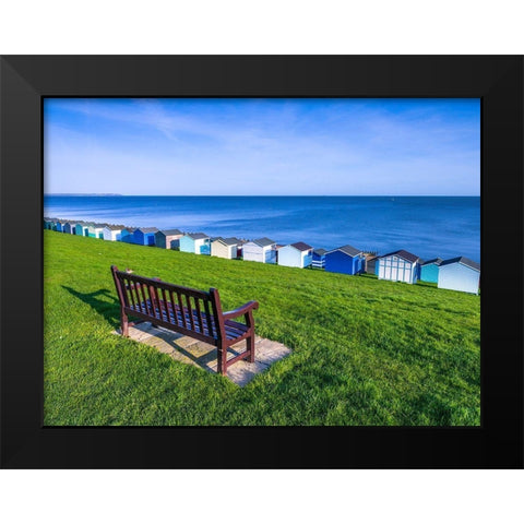 Bench on lawn with beach huts in background Black Modern Wood Framed Art Print by Frank, Assaf