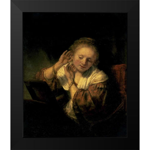 Young Woman Trying Earrings, 1654 Black Modern Wood Framed Art Print by Rembrandt