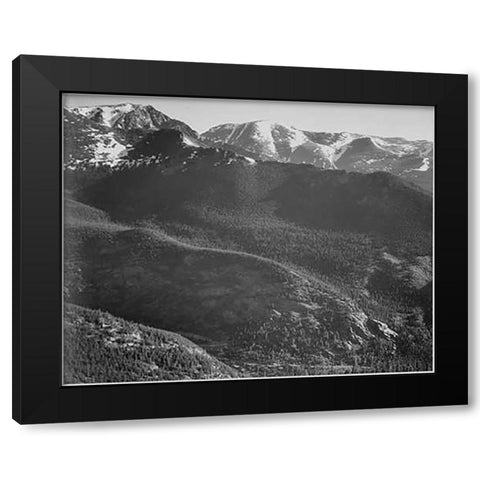 View of wooded hills with mountains in background, in Rocky Mountain National Park, Colorado, ca. 19 Black Modern Wood Framed Art Print with Double Matting by Adams, Ansel