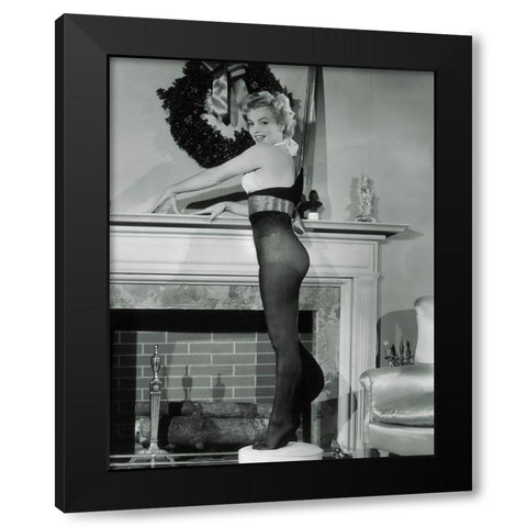 Marilyn Monroe - Christmas Stockings Black Modern Wood Framed Art Print by Hollywood Photo Archive