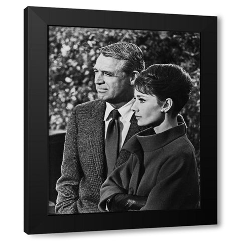Cary Grant with Audrey Hepburn - Charade Black Modern Wood Framed Art Print with Double Matting by Hollywood Photo Archive