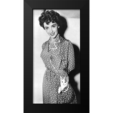 Elizabeth Taylor with a kitten in her pocket Black Modern Wood Framed Art Print by Hollywood Photo Archive