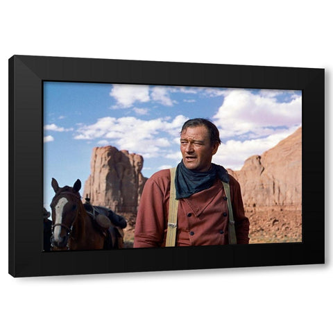 John Wayne Black Modern Wood Framed Art Print with Double Matting by Hollywood Photo Archive