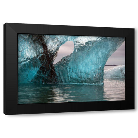 Icebergs from the Jokulsarlon glacier drift in Jokulsarlon lagoon in Iceland Black Modern Wood Framed Art Print by Steve Mohlenkamp