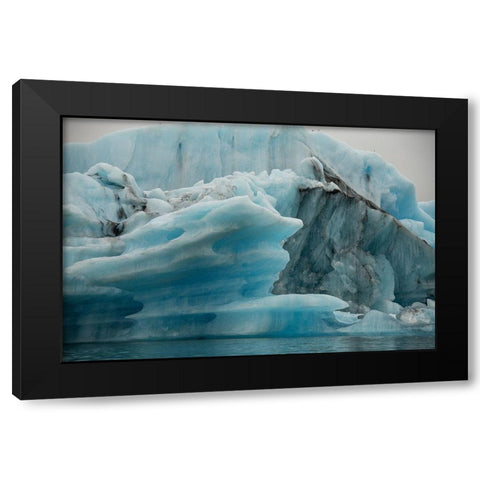 Icebergs from the Jokulsarlon glacier drift in Jokulsarlon lagoon in Iceland Black Modern Wood Framed Art Print by Steve Mohlenkamp