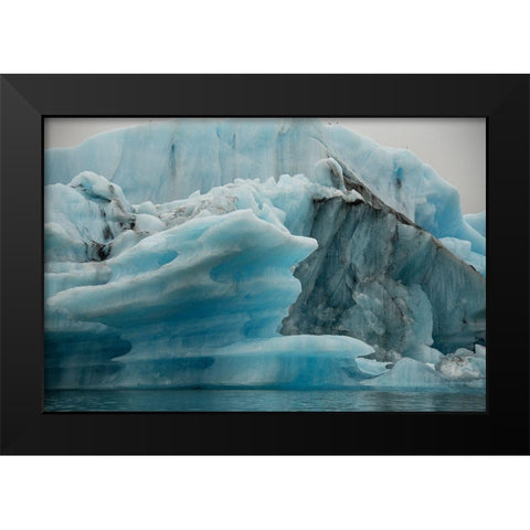Icebergs from the Jokulsarlon glacier drift in Jokulsarlon lagoon in Iceland Black Modern Wood Framed Art Print by Steve Mohlenkamp