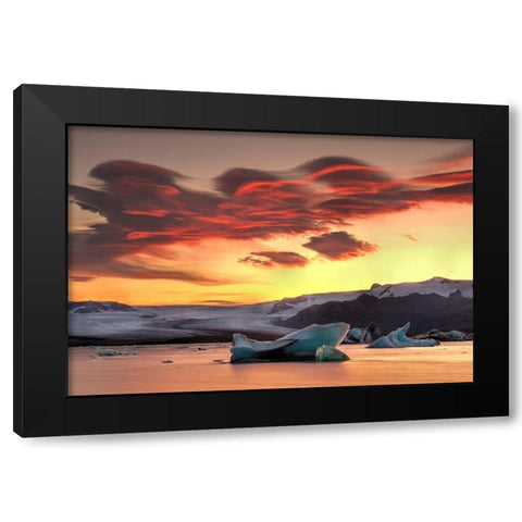 Icebergs from the Jokulsarlon glacier adrift in sunset in Jokulsarlon lagoon in Iceland Black Modern Wood Framed Art Print by Steve Mohlenkamp