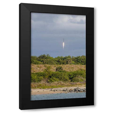 USA-Florida-Port Canaveral-A Space X rocket being launched from Cape Canaveral Black Modern Wood Framed Art Print by Looney, Hollice