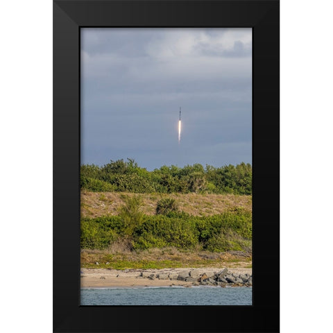 USA-Florida-Port Canaveral-A Space X rocket being launched from Cape Canaveral Black Modern Wood Framed Art Print by Looney, Hollice