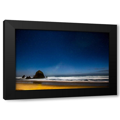 USA- Oregon. Cannon Beach and Haystack Rock stars showing during blue light. Black Modern Wood Framed Art Print with Double Matting by Gulin, Darrell