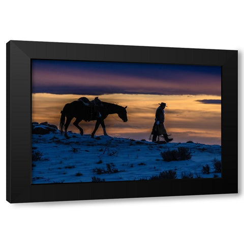 USA- Wyoming. Hideout Horse Ranch- wrangler and horse at sunset. Black Modern Wood Framed Art Print by Looney, Hollice