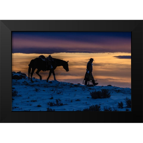 USA- Wyoming. Hideout Horse Ranch- wrangler and horse at sunset. Black Modern Wood Framed Art Print by Looney, Hollice