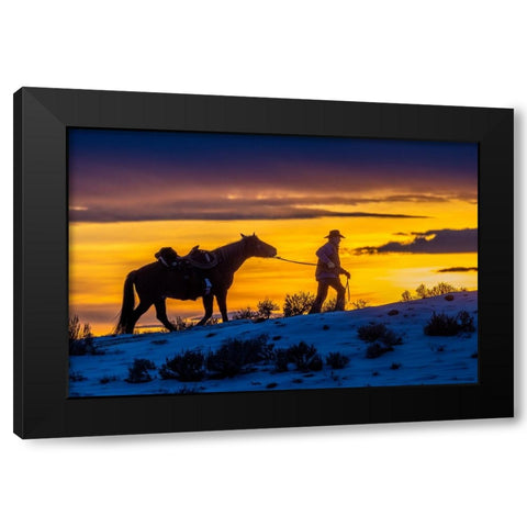 USA- Wyoming. Hideout Horse Ranch- wrangler and horse at sunset. Black Modern Wood Framed Art Print by Looney, Hollice