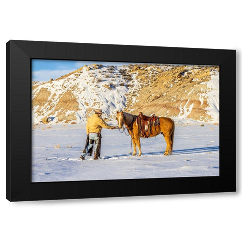 USA- Wyoming. Hideout Horse Ranch- wrangler and horse in snow. Black Modern Wood Framed Art Print with Double Matting by Looney, Hollice