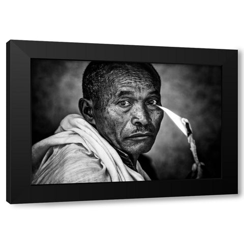 Ethiopian Man Holding A Lit Candle In A Religious Ceremony. Black Modern Wood Framed Art Print with Double Matting by Inazio Kuesta, Joxe