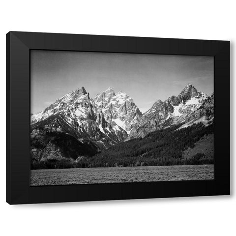 Grassy valley and snow covered peaks, Grand Teton National Park, Wyoming, 1941 Black Modern Wood Framed Art Print by Adams, Ansel