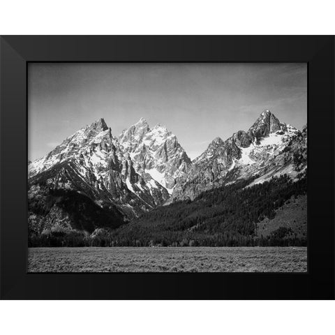 Grassy valley and snow covered peaks, Grand Teton National Park, Wyoming, 1941 Black Modern Wood Framed Art Print by Adams, Ansel
