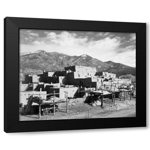 Full view of city, mountains in background, Taos Pueblo National Historic Landmark, New Mexico, 1941 Black Modern Wood Framed Art Print by Adams, Ansel