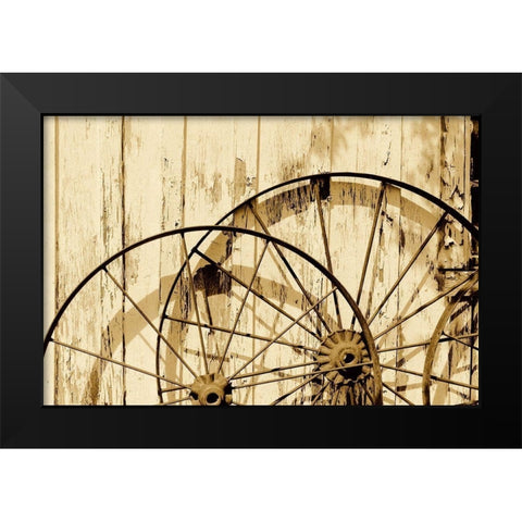 Old wagon wheels against a shed in Buffalo Gap Historic Village, near Abilene, TX - Sepia Black Modern Wood Framed Art Print by Highmith, Carol