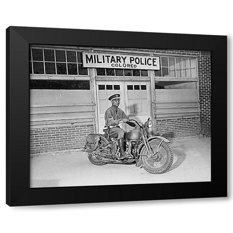 WWII An MP on motorcycle stands ready to answer all calls around his area. Columbus-Georgia Black Modern Wood Framed Art Print by U.S. Archives