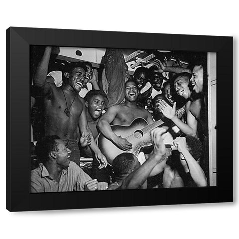 WWII men aboard the U.S.S. Ticonderoga hear the news of Japans surrender Black Modern Wood Framed Art Print with Double Matting by U.S. Archives