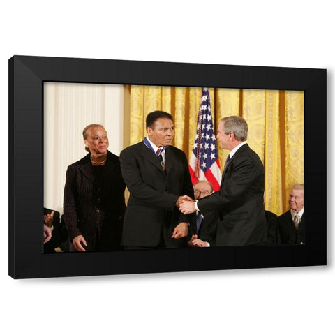 President George W. Bush Shakes Hands with Muhammad Ali Black Modern Wood Framed Art Print with Double Matting by U.S. Archives