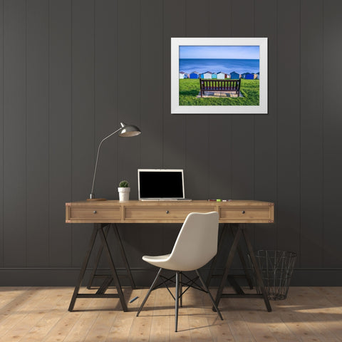 Bench on lawn with beach huts in background White Modern Wood Framed Art Print by Frank, Assaf