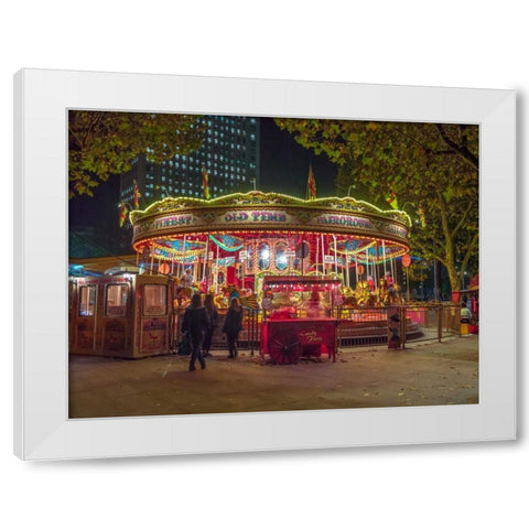 Spinning carousel at night in garden, London, UK White Modern Wood Framed Art Print by Frank, Assaf