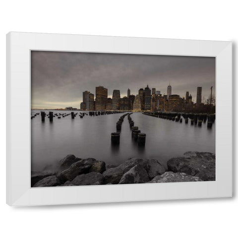 Manhattan skyline with rows of groynes in East river, New York White Modern Wood Framed Art Print by Frank, Assaf