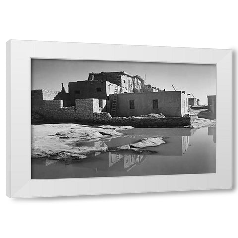 Adobe House with Water in Foreground - Acoma Pueblo, New Mexico - National Parks and Monuments, ca. White Modern Wood Framed Art Print by Adams, Ansel