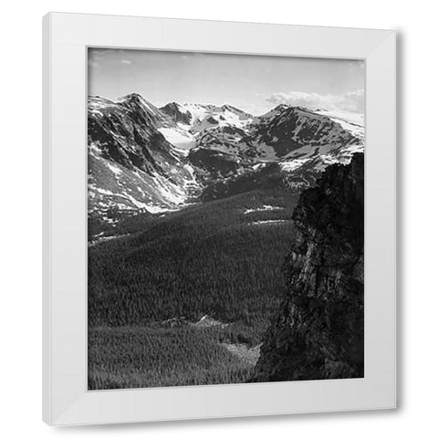 View of snow-capped mountain timbered area below, in Rocky Mountain National Park, Colorado, ca. 194 White Modern Wood Framed Art Print by Adams, Ansel