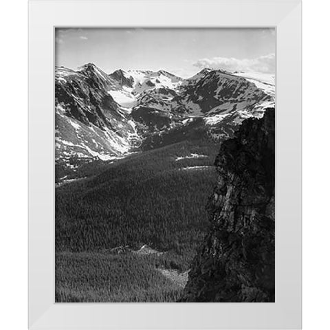 View of snow-capped mountain timbered area below, in Rocky Mountain National Park, Colorado, ca. 194 White Modern Wood Framed Art Print by Adams, Ansel