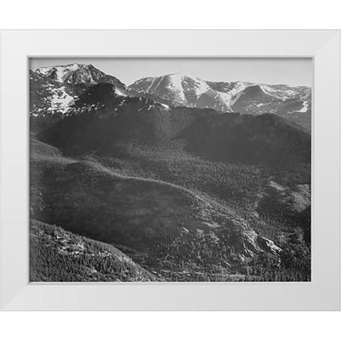 View of wooded hills with mountains in background, in Rocky Mountain National Park, Colorado, ca. 19 White Modern Wood Framed Art Print by Adams, Ansel