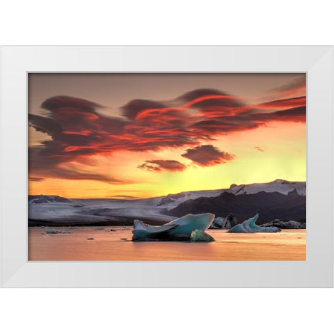 Icebergs from the Jokulsarlon glacier adrift in sunset in Jokulsarlon lagoon in Iceland White Modern Wood Framed Art Print by Steve Mohlenkamp